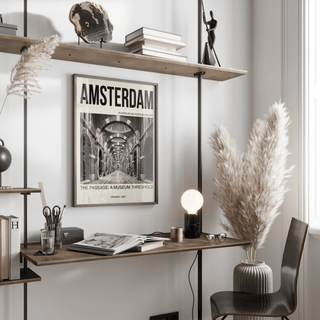 Typographic city poster featuring Amsterdam title above a symmetrical museum passage photo