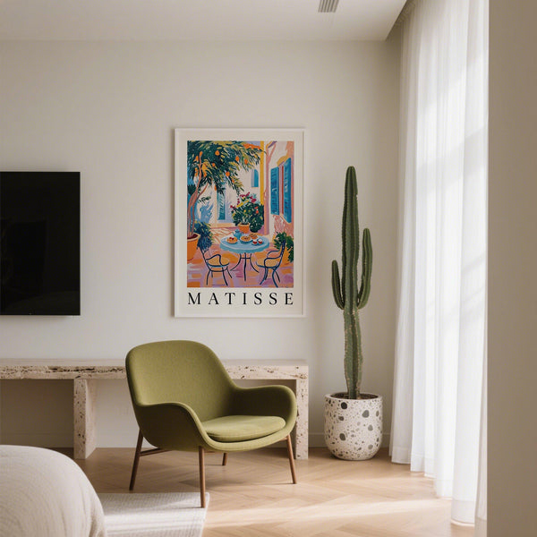 Mediterranean terrace captured in wall art Mediterranean print with coffee and pastries.