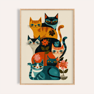 Framed print of a group of retro cats in orange, blue, and black with floral details