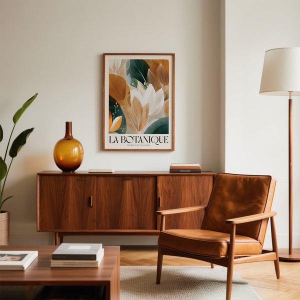 Wall art with leaves in earthy orange and deep green tones