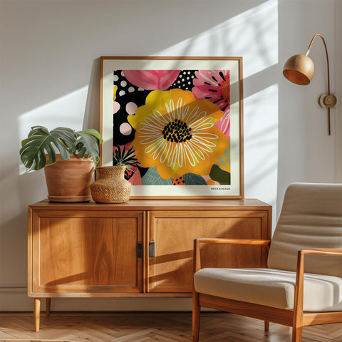 Square wall art featuring a bold yellow flower illustration.