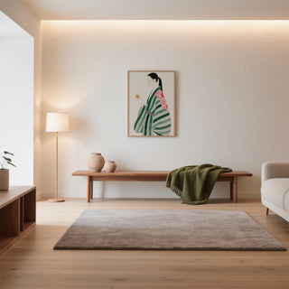 Unique wall art for living room featuring a poised woman with an orange fruit.