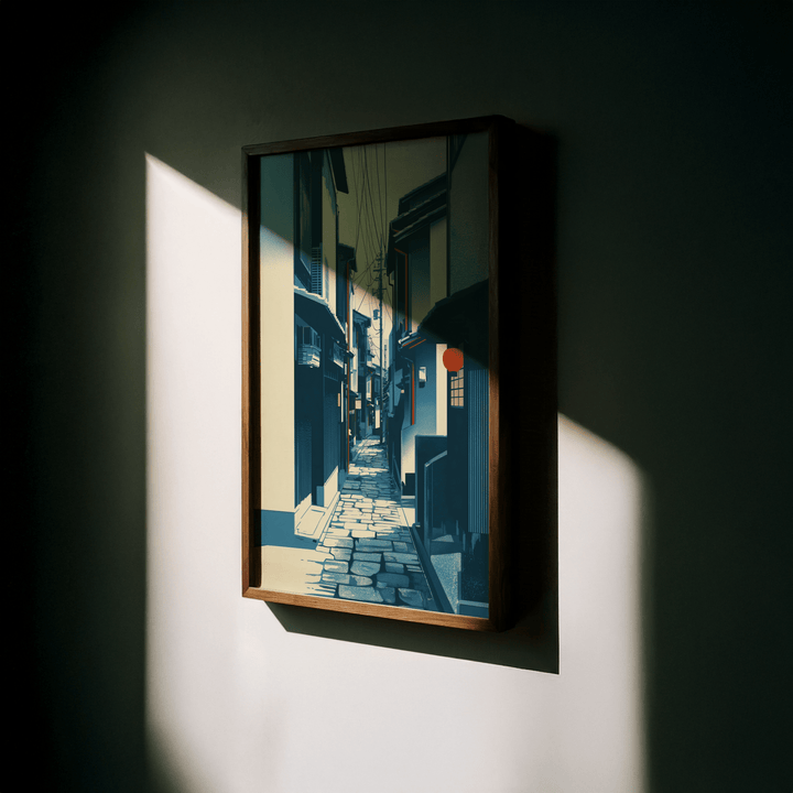 Framed Japanese Street wall art of a narrow Kyoto street with blue and cream tones in a shadowed setting
