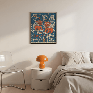 Illustrated wall poster of two Okinawan shisa guardians framed by clouds