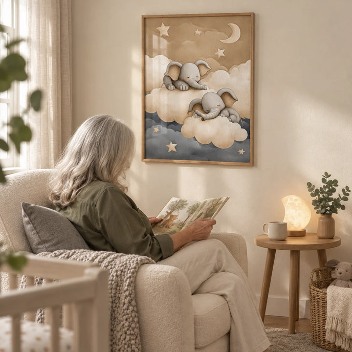 Baby Elephants Nursery Art, framed on the wall of a nursery feeding corner with a cream wall