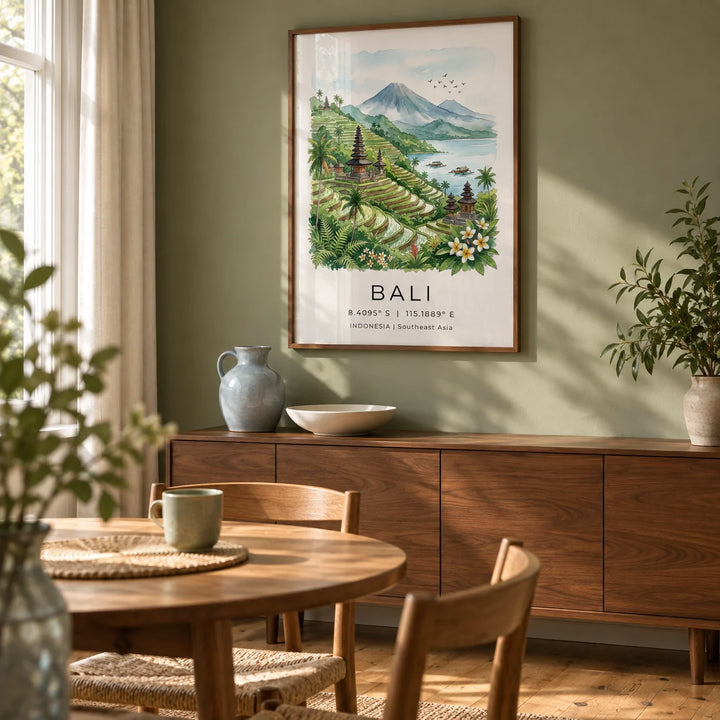 Bali Landscape Art Print, framed on the wall of a relaxed dining room in a UK garden flat with a muted leaf green wall and warm timber floorboards