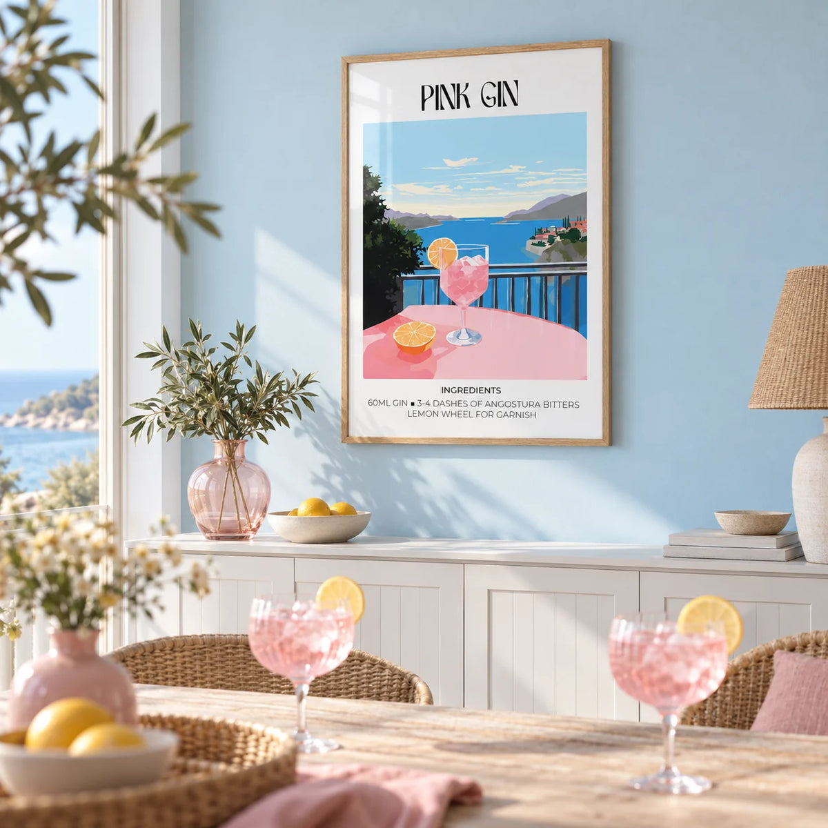 Bar Cart Art, framed on the wall of a bright coastal dining room with a pale blue wall