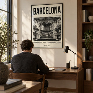 Barcelona Concert Hall Poster, framed on the wall of a quiet home study for an architecture enthusiast with an ivory wall and built-in walnut shelving