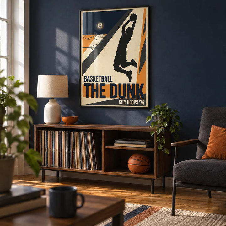 Basketball Dunk Art Print, framed on the wall of a compact basketball fan's games den in a UK terrace with a muted navy wall and warm wood flooring in a living room