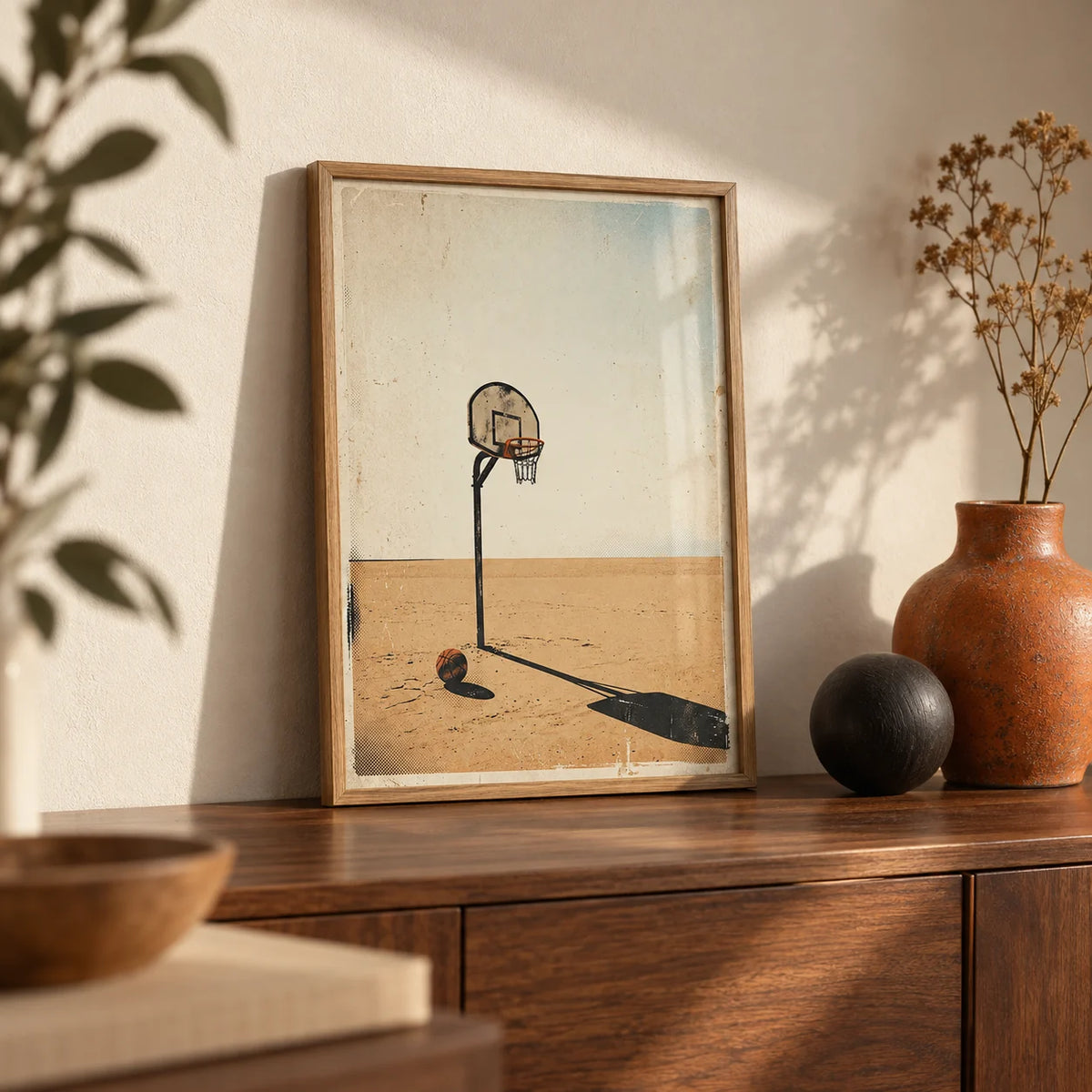 Basketball Hoop Art, a small A4 framed print leaning on a walnut sideboard in a living room