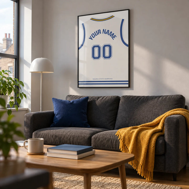 Basketball Jersey Poster in White with Blue Number, framed on the wall of a compact modern living room in a basketball fan's first UK flat (22-28)