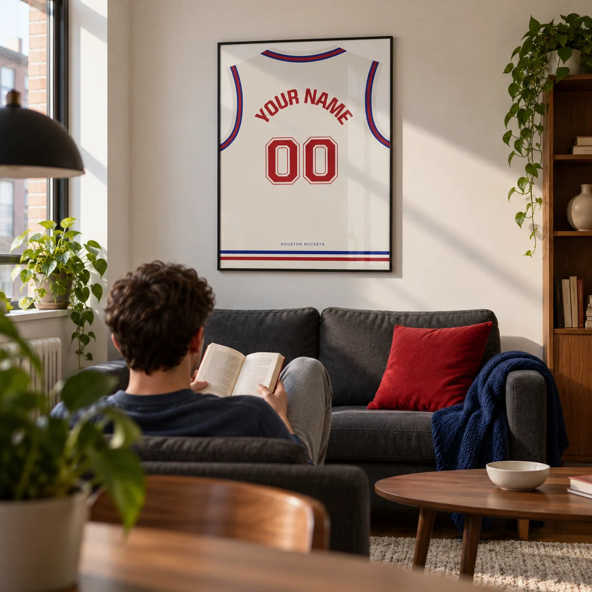 Basketball Jersey Poster in White with Red Number, framed on the wall of a compact modern living room in a young basketball fan's first UK flat (22-28)