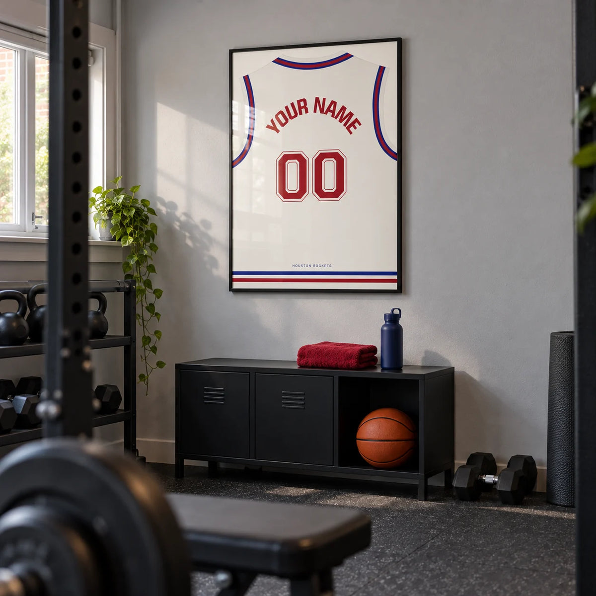 Basketball Jersey Poster in White with Red Number, framed on the wall of a tidy converted garage home gym in a UK semi-detached house
