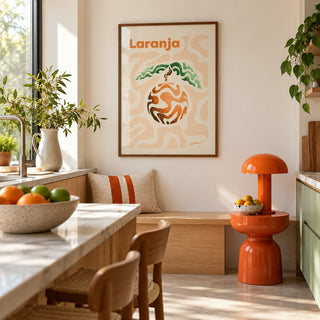 Basque Orange Print hung above a breakfast bench in a colourful minimalist kitchen (frame not included)
