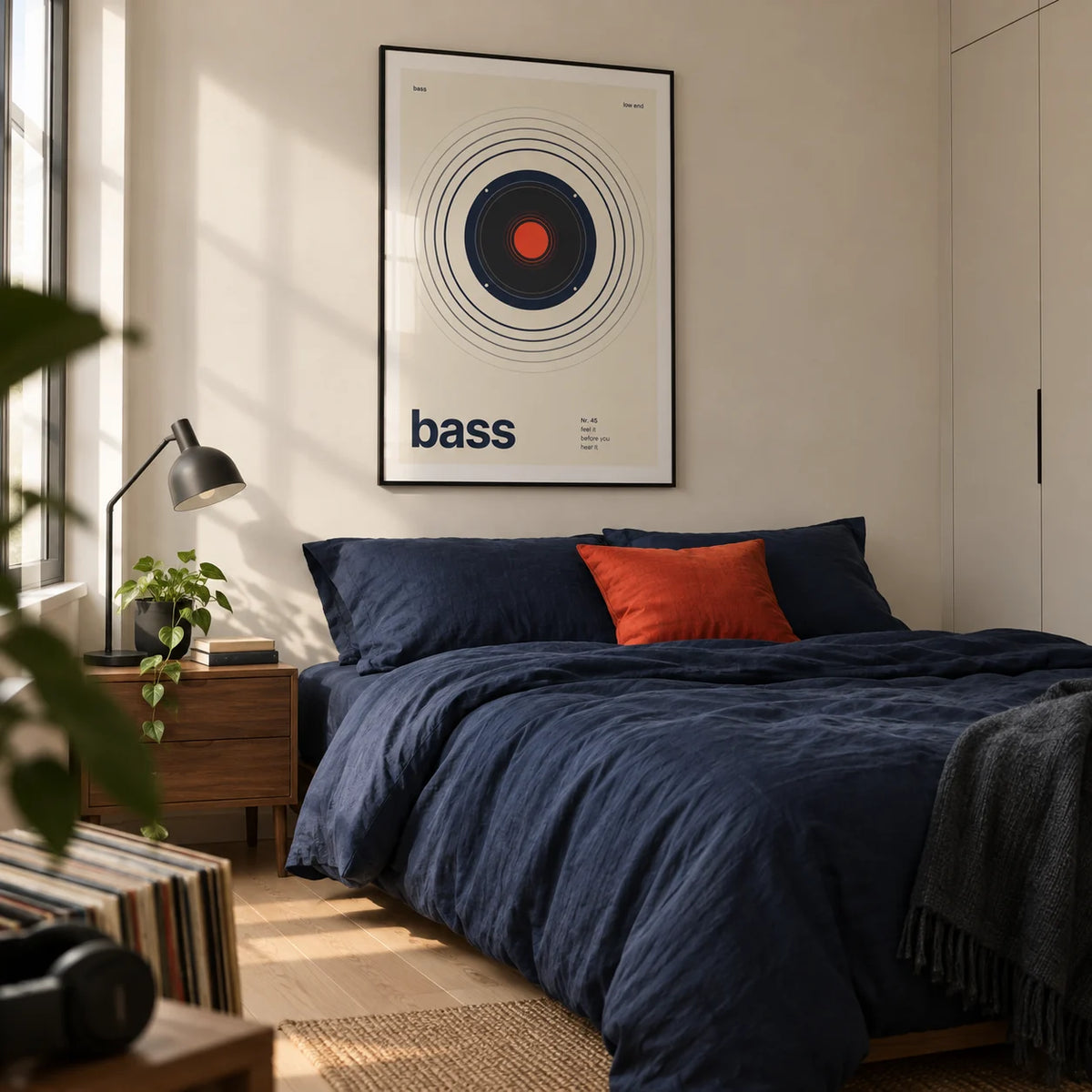 Bass Poster, framed on the wall of a crisp first-flat bedroom for a music lover aged 22-28 with a cream wall and pale timber floor