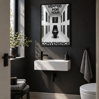 Bathroom Funny Print, framed on the wall of a small downstairs cloakroom loo with a plain black painted wall