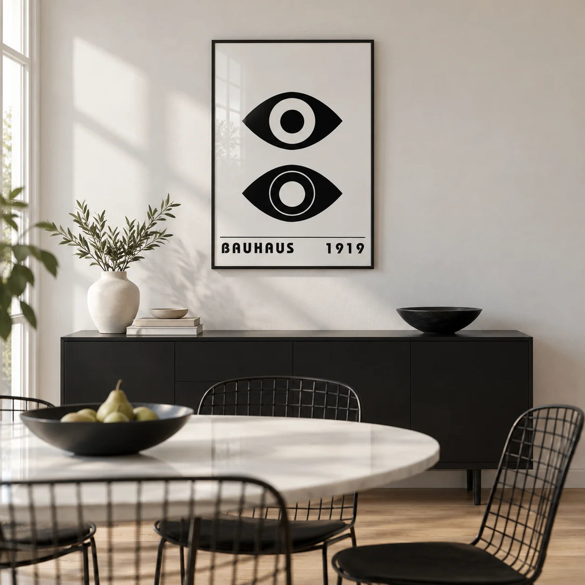 Bauhaus Art Print, framed on the wall of a modern dining room with a white wall and a pale oak floor