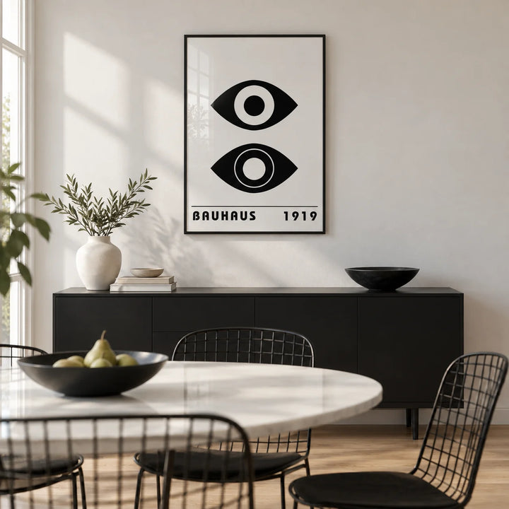 Bauhaus Art Print, framed on the wall of a modern dining room with a white wall and a pale oak floor