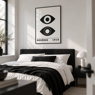 Bauhaus Art Print, framed on the wall of a monochrome bedroom with a white wall