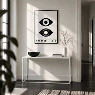 Bauhaus Art Print, framed on the wall of a monochrome hallway with a white wall and a black floor