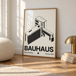 Bauhaus Building Poster, framed on the wall of a calm white room with a white skirting board and herringbone oak parquet