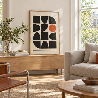 Bauhaus Geometric Shapes, framed on the wall of a light living room with big windows