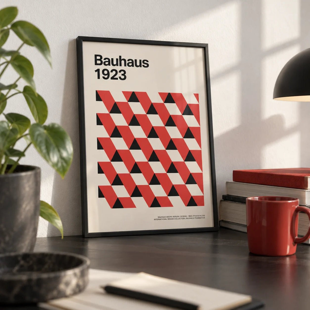 Bauhaus Pictures, a small A4 framed print leaning on a black desk