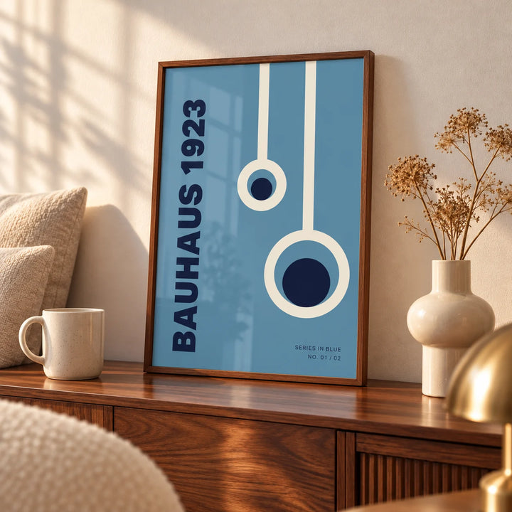 Bauhaus Posters, an A3 framed print leaning on a walnut sideboard in a living room
