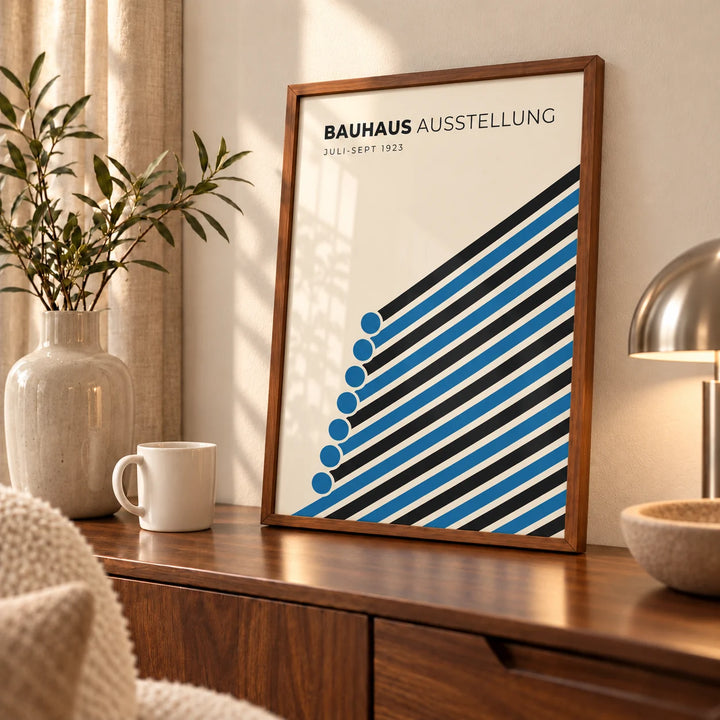 Bauhaus Print, an A3 framed print leaning on a walnut sideboard in a living room