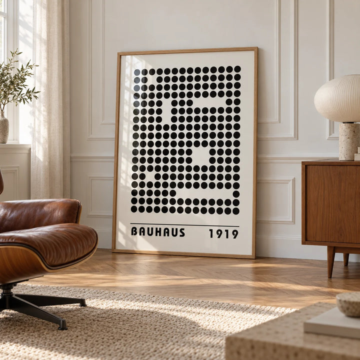 Bauhaus Prints, framed on the wall of an elegant room with white panelled walls with classic mouldings and a herringbone oak floor in soft side light