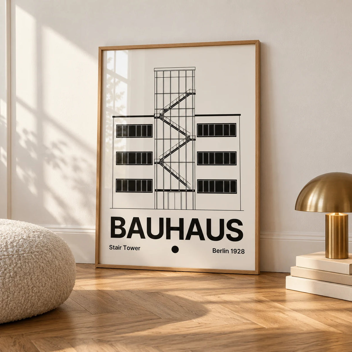 Bauhaus Staircase Print, framed on the wall of a calm white room with a white skirting board and herringbone oak parquet