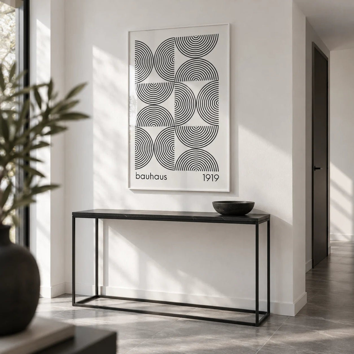 Bauhaus Wall Art, framed on the wall of a crisp modern hallway