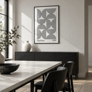 Bauhaus Wall Art, framed on the wall of a modern monochrome dining room
