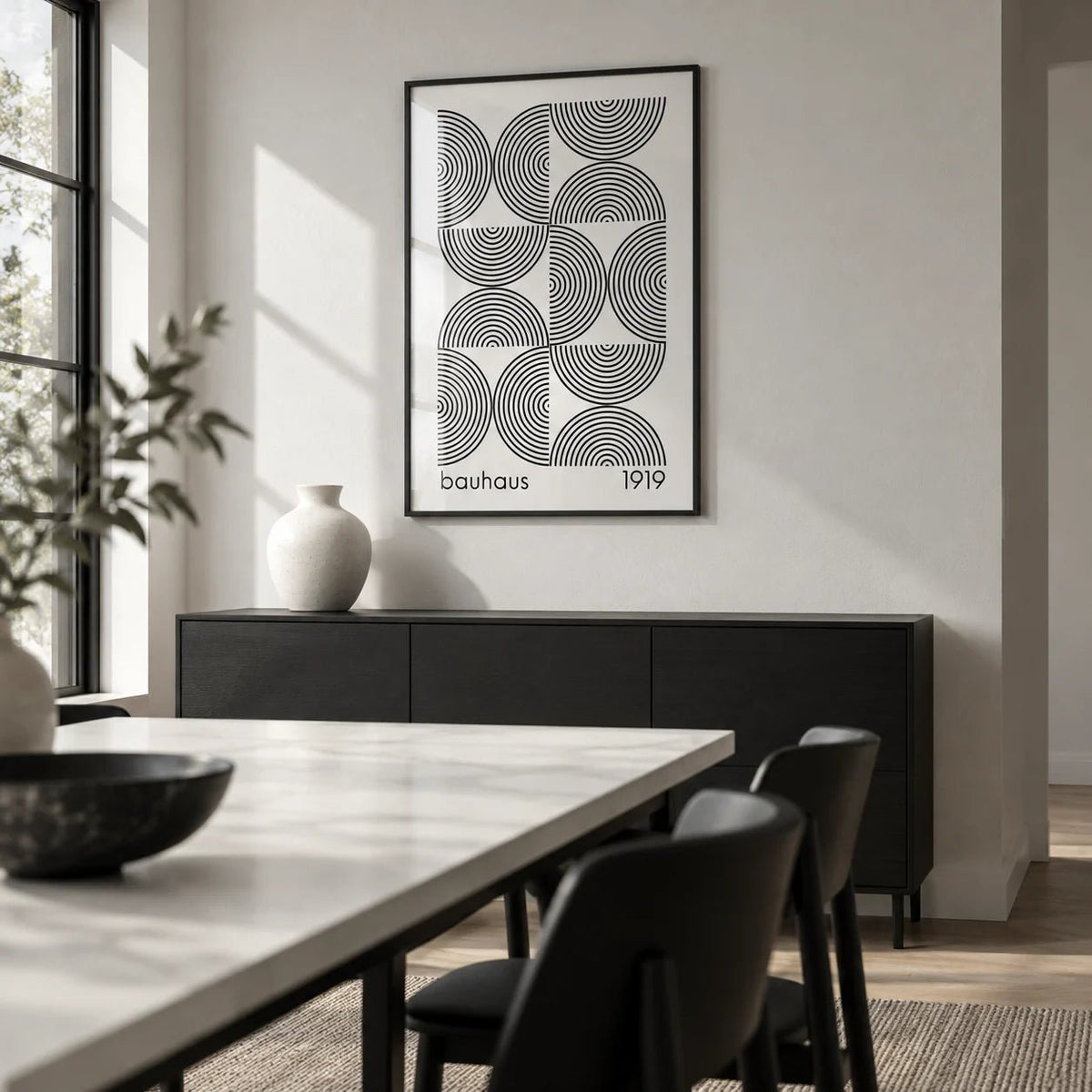 Bauhaus Wall Art, framed on the wall of a modern monochrome dining room