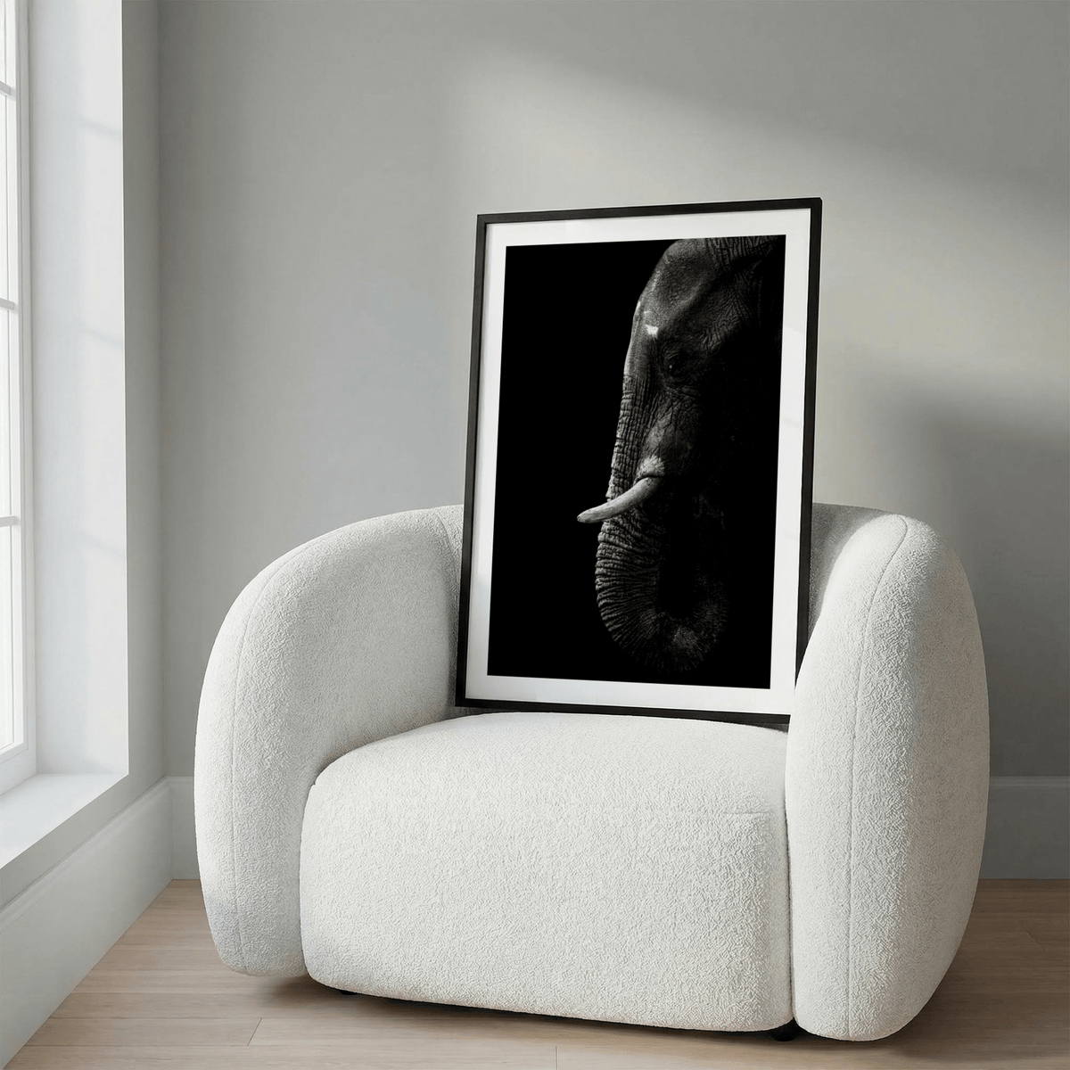 Wildlife Photography Art print of an elephant walking toward the camera on a dusty path