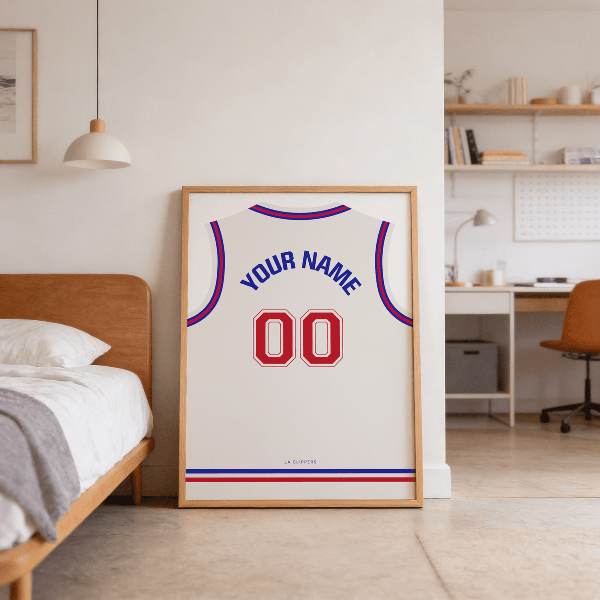 Framed LA Clippers Basketball Jersey Poster with Blue, Red, White trim on shelf backdrop