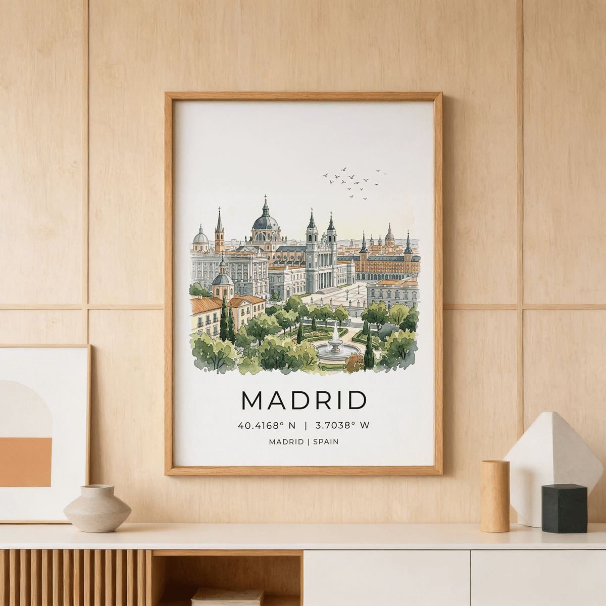 Watercolor-style Madrid skyline poster showing domes, spires, and tree-lined plaza with fountain