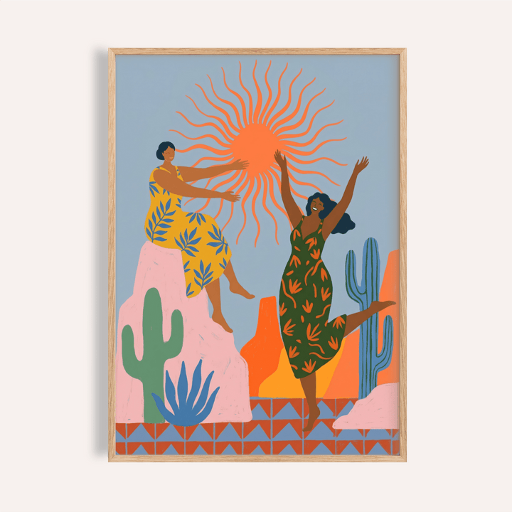 Sunset Women Art Print featuring two figures reaching toward a radiant sunburst