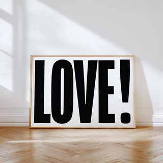 Gallery wall enhanced with black and white large motivational posters