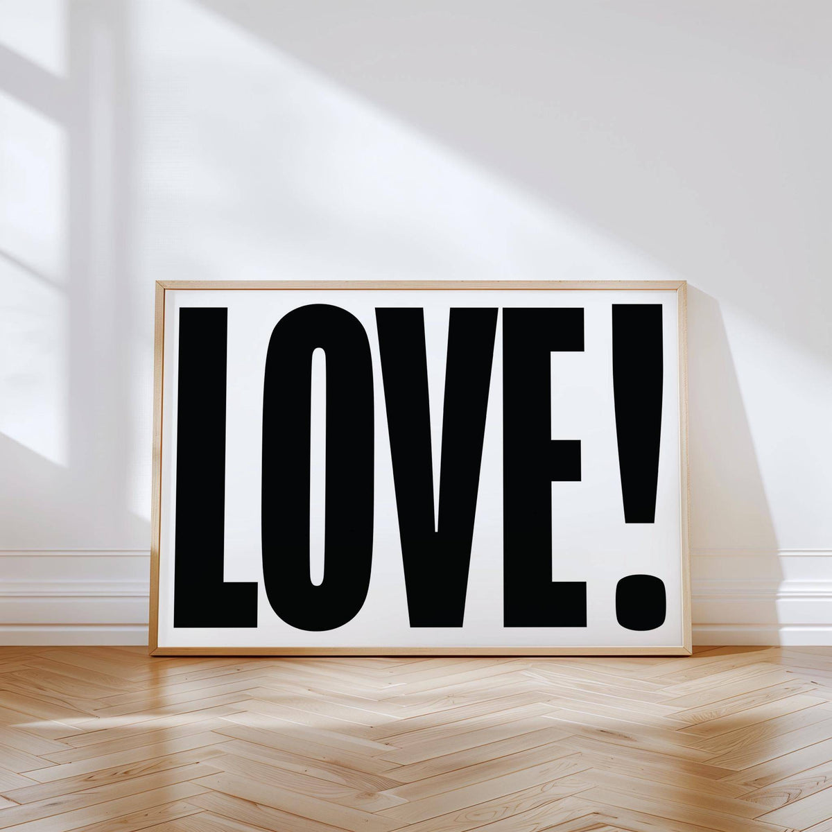 Gallery wall enhanced with black and white large motivational posters