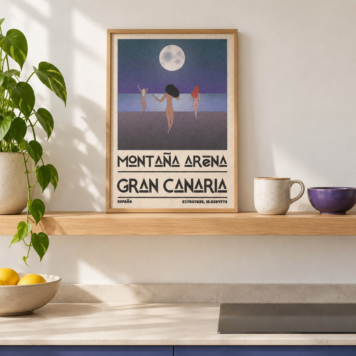 Beach Figures Art Print shown in the small A4 size on a kitchen shelf (frame not included)