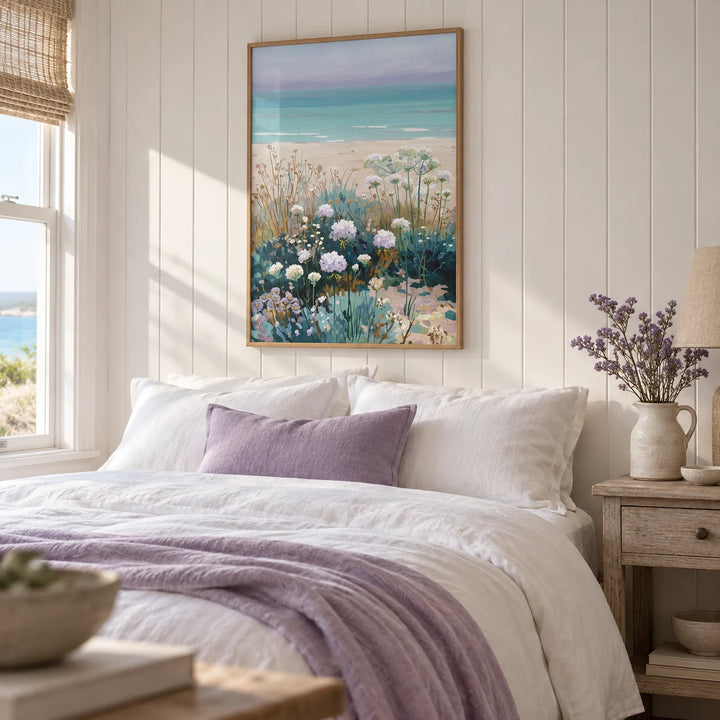 Beach Floral Art, framed on the wall of a seaside cottage bedroom with whitewashed tongue-and-groove panelling