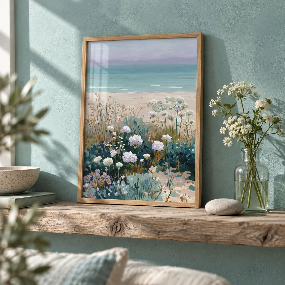 Beach Floral Art, a small A4 framed print leaning on a driftwood shelf in a living room