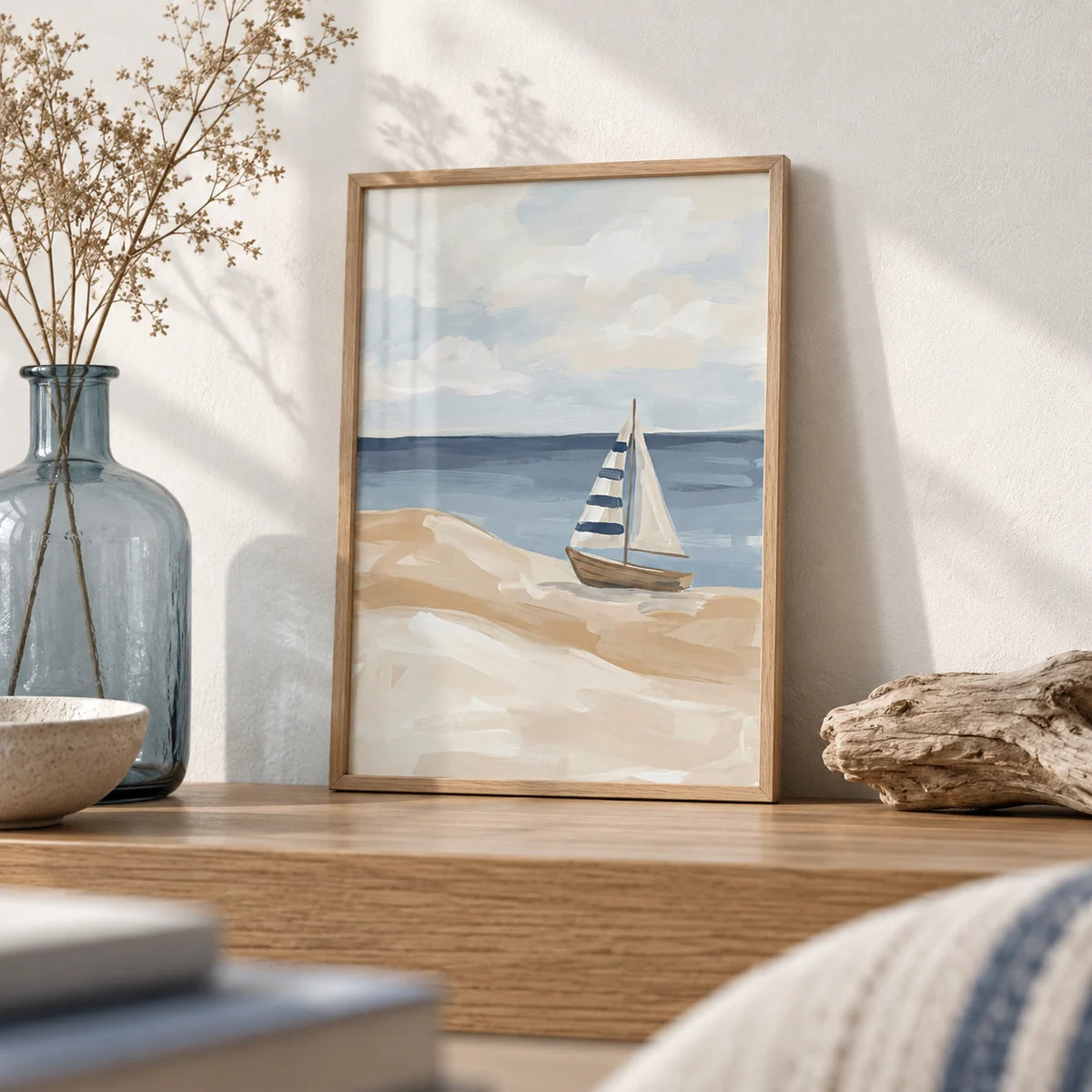 Beach Sailboat Wall Art, a small A4 framed print leaning on an oak shelf in a living room