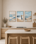 Beach-themed wall art in a kitchen setting with neutral tones.