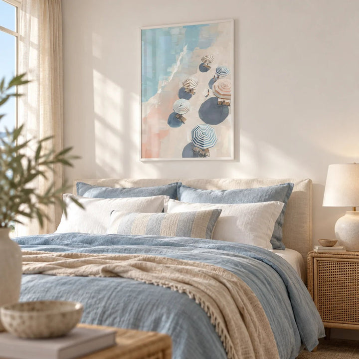 Beach Umbrella Print, framed on the wall of a light coastal bedroom