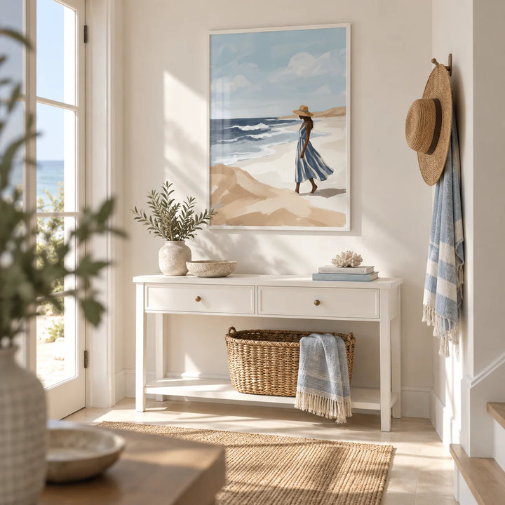 Beach Woman Art Print, framed on the wall of a bright seaside hallway