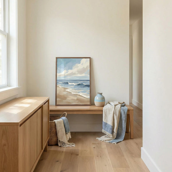 Nautical-themed room with a beach scene painting, wooden bench, and decorative items.