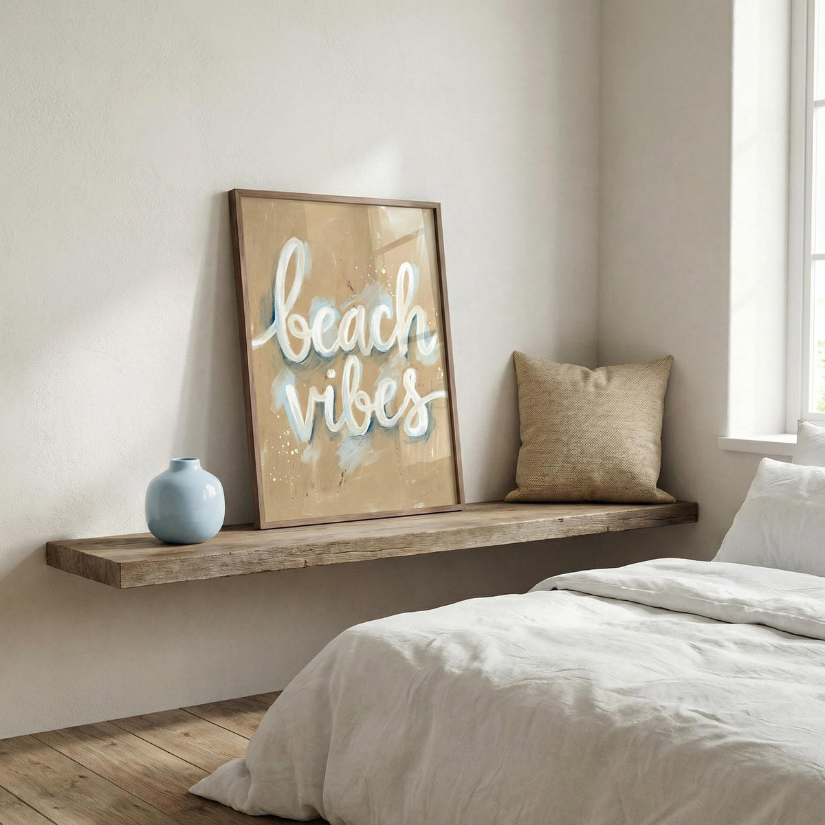 Bedroom with a wooden shelf, 'beach vibes' sign, and a vase.
