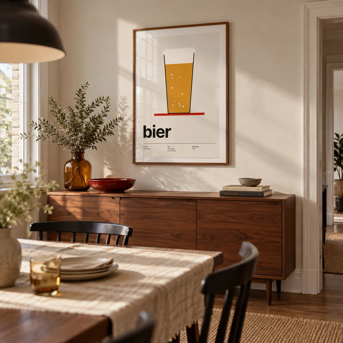 Beer Poster, framed on the wall of a contemporary dining room in a British terraced house with a warm white wall and walnut floor